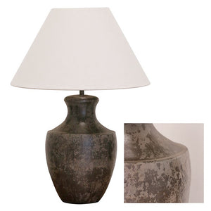 Table lamp with base in aged pewter finish base and oatmeal coloured shade