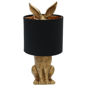 Rabbit shaped lamp with black fabric shade.