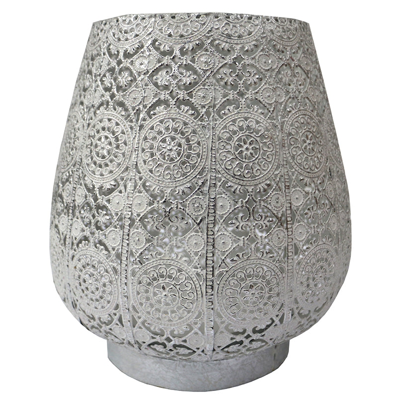 Bowl shaped lamp with ornate design. 