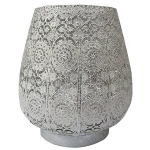 Bowl shaped lamp with ornate design. 