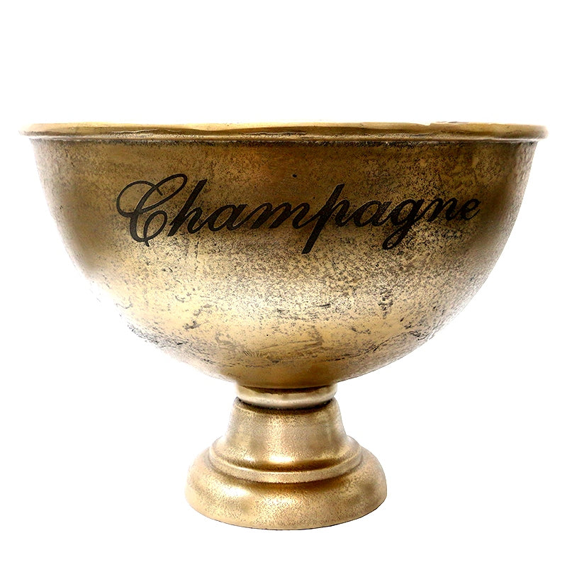 Alumimium bowl in raw gold colour and word Champagne on the outside.