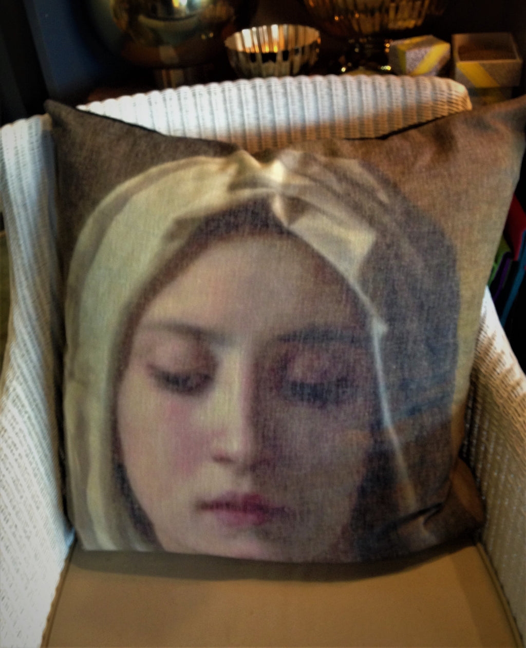 Large square cushion with female face print..
