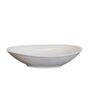 Oval shaped serving dish in white coloured stoneware