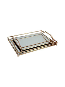 Rectangle shaped serving trays with glass and gold coloured metal edges with handles.