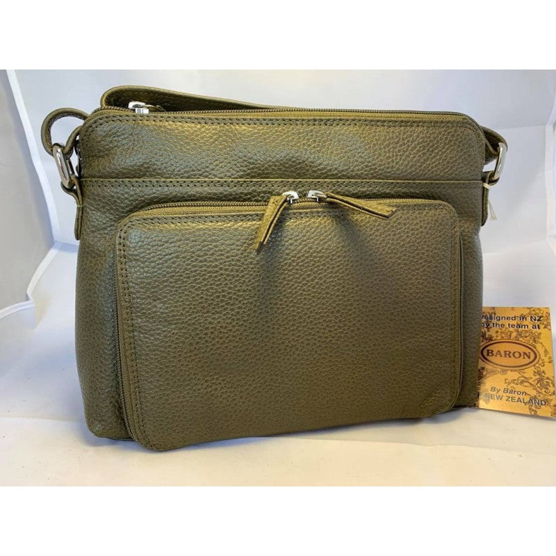 Green coloured leather handbag with multiple zip pockets and adjustable shoulder strap.