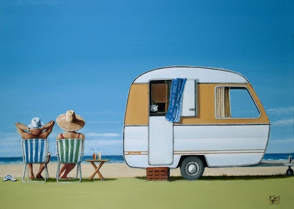 Print featuring two people relaxing next to a small caravan near to a beach.